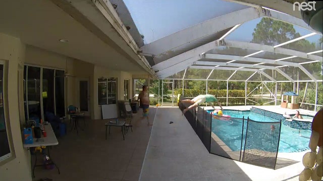 Hero dad leaps over pool fence, dives head-first to rescue toddler son from drowning