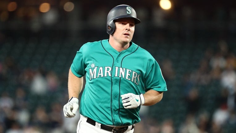 Jay Bruce of the Seattle Mariners laps the bases after hitting his 300th career home run. (Photo by Abbie Parr/Getty Images)