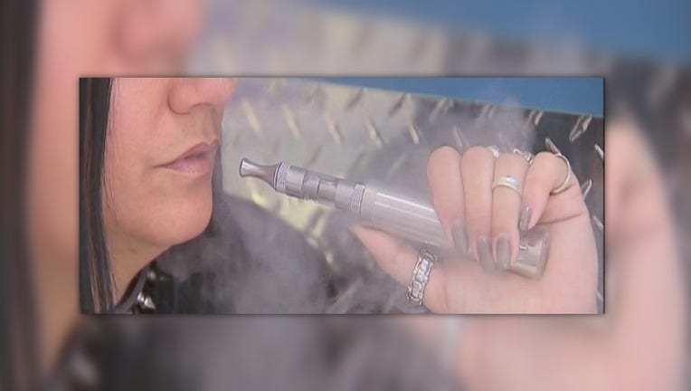 Vaping e-cigarettes