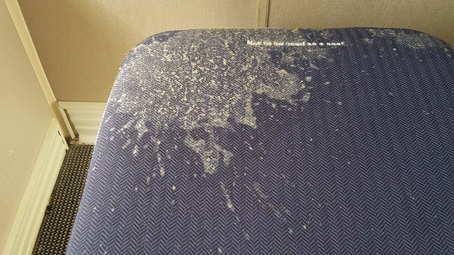 Dave Gildea shared a photo of the footstool at his seat, which shows the apparent dried vomit.