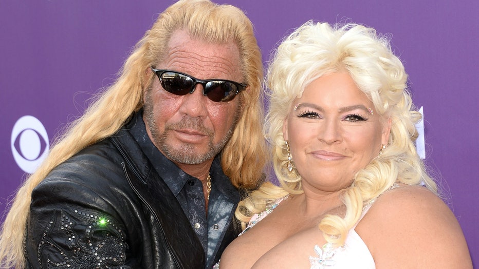 TV personalities Dog the Bounty Hunter (L) and Beth Chapman arrive at the 48th Annual Academy of Country Music Awards at the MGM Grand Garden Arena on April 7, 2013 in Las Vegas, Nevada. (Photo by Jason Merritt/Getty Images)