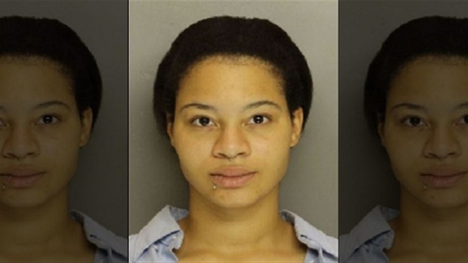 Jhenea Pratt is pictured in a booking photo.