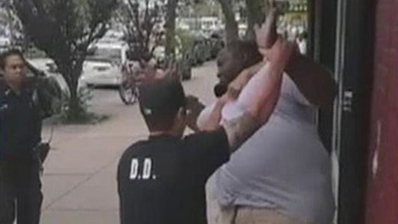 NYPD fires officer for '14 death of Eric Garner