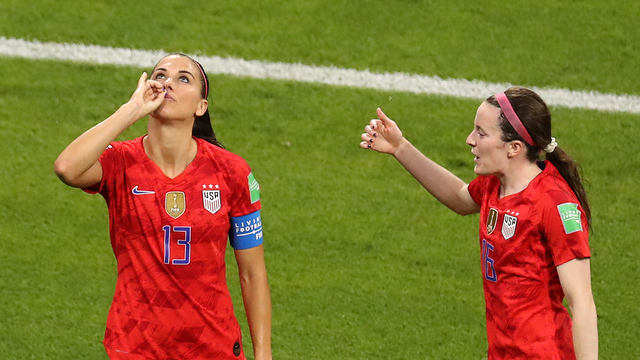 U.S. Soccer’s Alex Morgan sips the tea after scoring goal against England on her birthday