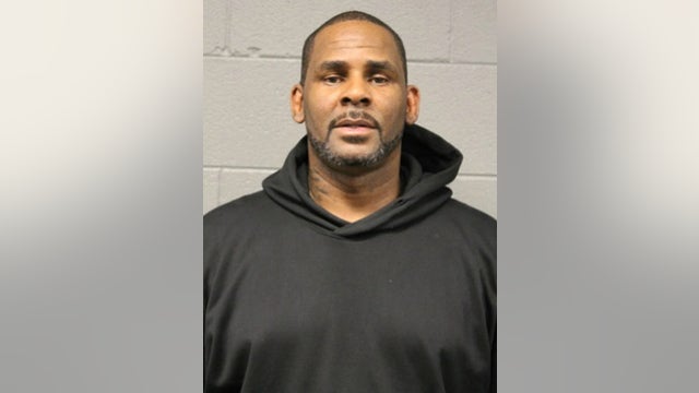 R. Kelly charged with paying bribe to marry Aaliyah when she was 15