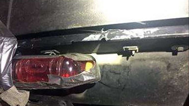 Driver replaces tail light with red sports drink