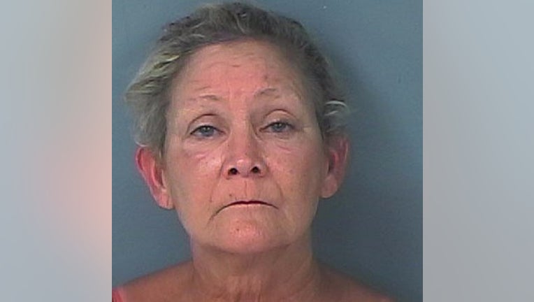 Florida woman arrested after waving a shotgun at kids.