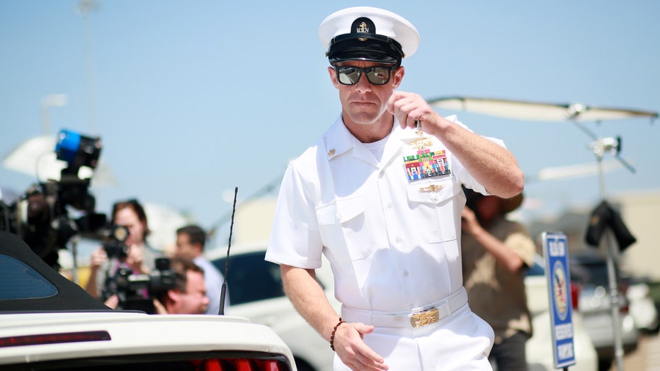 Navy Special Operations Chief Edward Gallagher walks out of military court during lunch recess on July 2, 2019 in San Diego, California. (Photo by Sandy Huffaker/Getty Images)