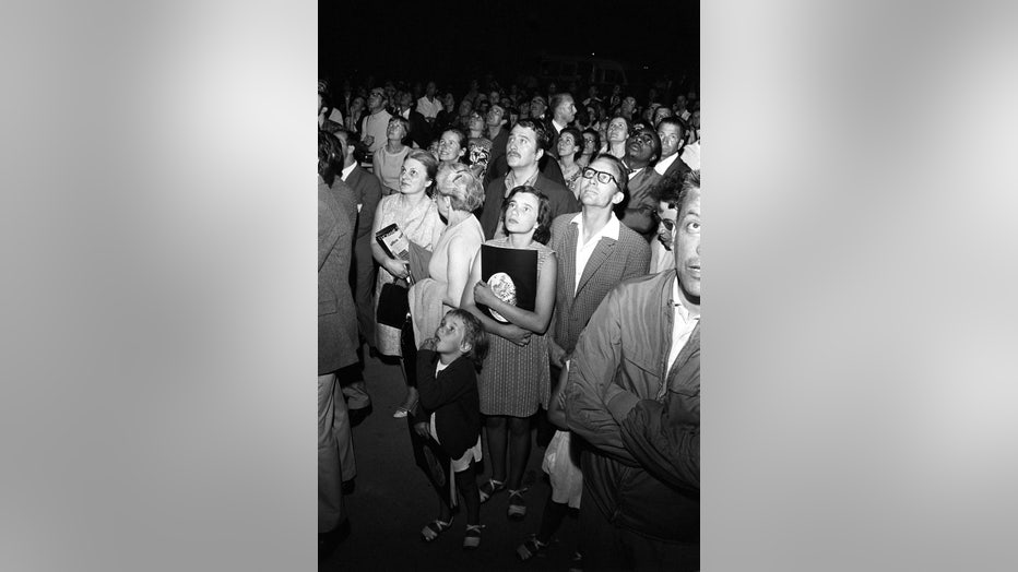 FRANCE: Crowd watching the images of Apollo 11 in Paris, France on July 21, 1969.