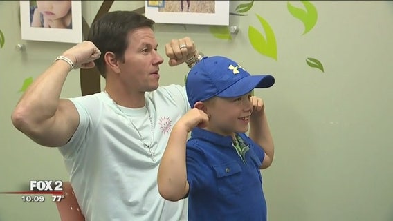 Mark Wahlberg meets boy who beat cancer before opening of Royal Oak Wahlburgers