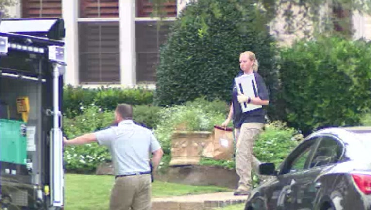 Officials in Allen, Texas search the El Paso shooter's grandparent's home for evidence.