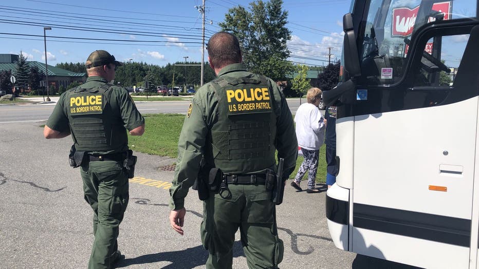 U.S. Customs and Border Protection agents conduct an immigration check. A six-month-old child is in critical condition at a Texas hospital after she was found by U.S. Border Agents along with her father and 21 others trying to make it across the Rio Grande into the United States