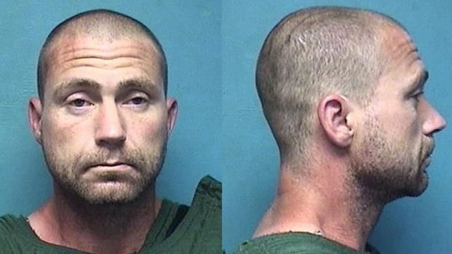 Lucas Mauritzen, 38, is pictured in a booking photo. (Photo credit: Independence Police Department)