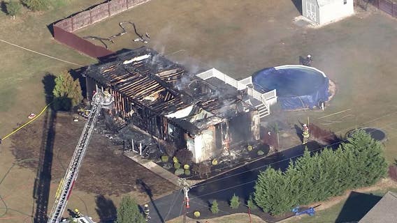 Crews battle massive house fire in Gloucester County
