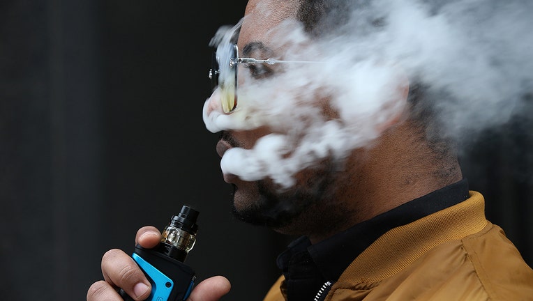 Man using a vaping device