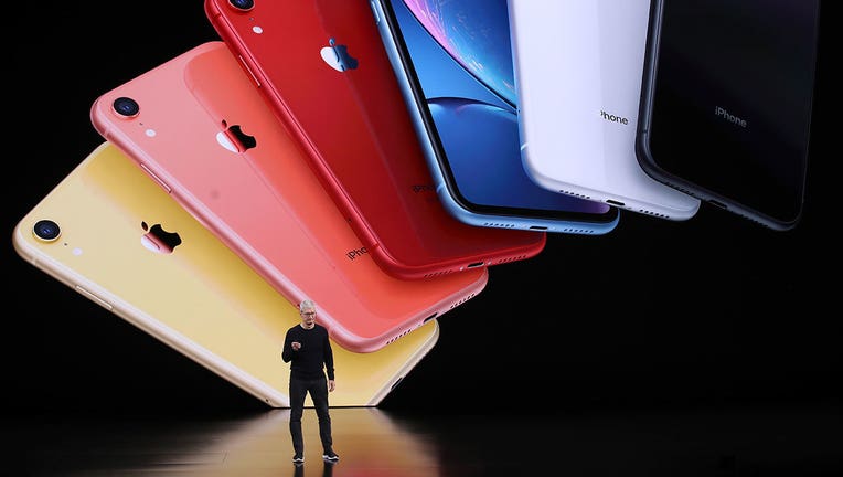 Apple CEO Tim Cook announces the new iPhone 11 as he delivers the keynote address during a special event on September 10, 2019 in the Steve Jobs Theater on Apple's Cupertino, California campus.
