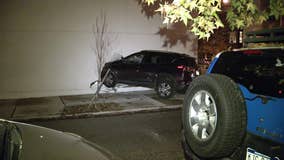 Car removed from side of North Philadelphia building