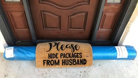 UPS driver 'hides' large package under doormat