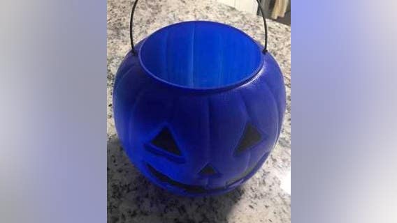 Raising autism awareness with blue Halloween buckets