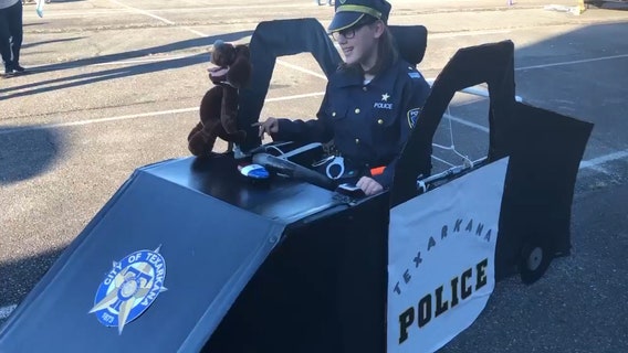 Girl's wheelchair becomes police car for amazing Halloween costume