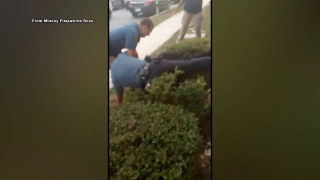Family claims police overstepped after loitering arrest outside their home