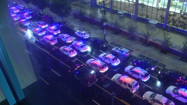 Philadelphia police officers brighten up the night for patients at Shriners Hospital