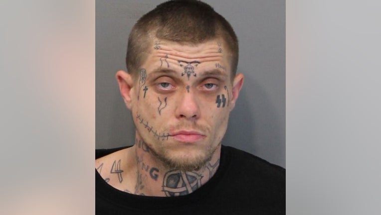 MAN-WITH-FACE-TATTOOS.jpg