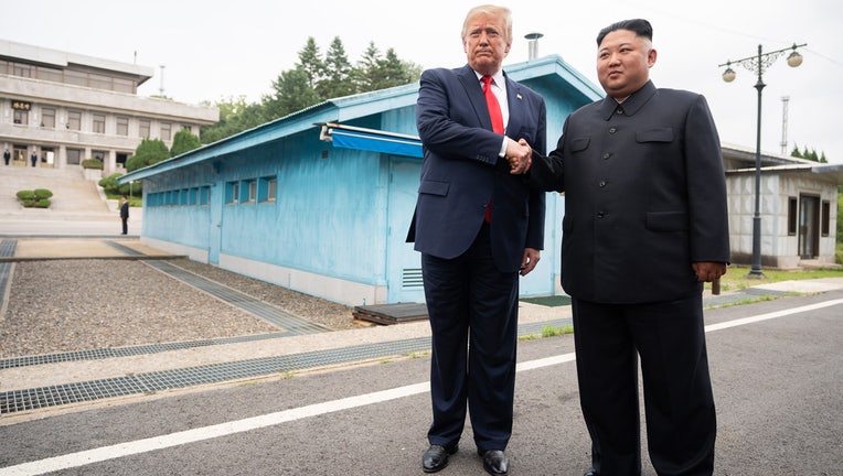 adf24e80-President Donald J. Trump and Chairman of the Workers’ Party of Korea Kim Jong Un speak with reporters outside Freedom House Sunday, June 30, 2019, at the Korean Demilitarized Zone. (Official White House Photo by Shealah Craighead)