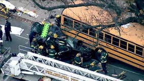 19-year-old critical after chain reaction crash leaves car wedged under school bus in West Philadelphia