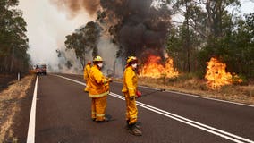 Pregnant Australian firefighter defends decision to fight flames: 'I don't just stay behind'