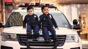 Toddler 'NYPD lieutenant' twins travel the country to honor police officers