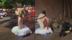 "Thank you, Jesus!" Man rocks Jesus Christ costume on Mill Avenue, gives bread to homeless man