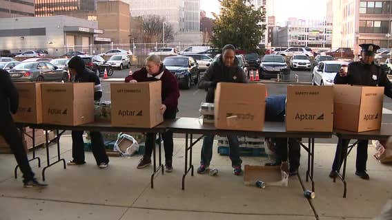Operation Thanksgiving: Philly police pack hundreds food baskets for families in need