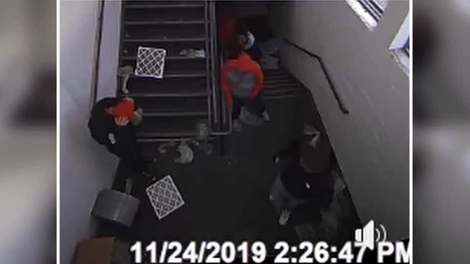 Group caught on camera vandalizing parking garage