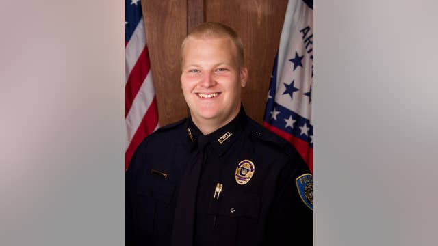 Arkansas authorities: Slain cop shot 10 times in head