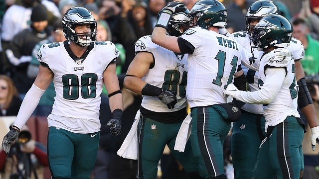 Wentz, Eagles keep NFC East hopes alive by beating Washington 37-27