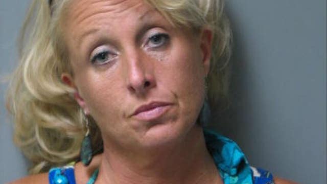 Police: Woman stabs boyfriend in neck with pen while driving