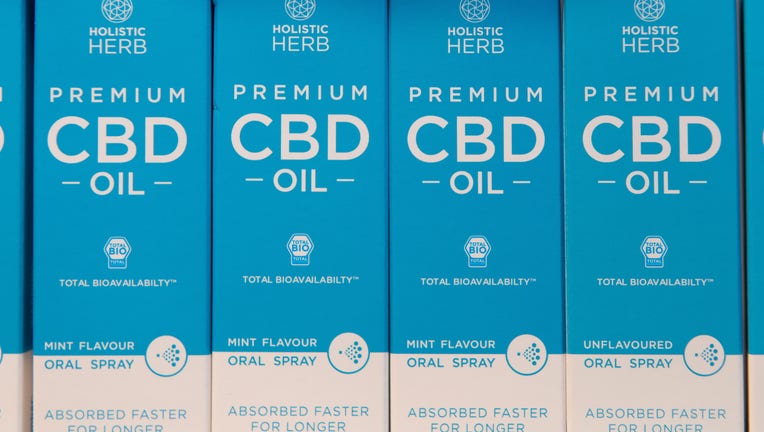 FILE - CBD cannabis oil for sale in a health store.