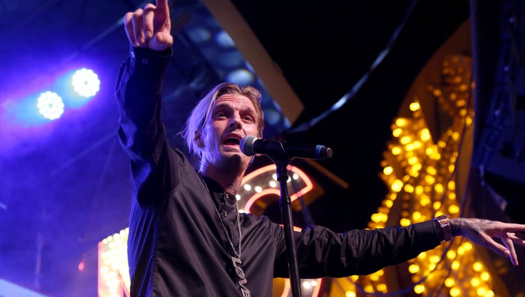 LAS VEGAS, NEVADA - JULY 27: Singer and producer Aaron Carter performs during the Pop 2000 Tour at the Fremont Street Experience on July 27, 2019 in Las Vegas, Nevada. (Photo by Gabe Ginsberg/Getty Images)