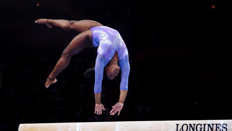 STUTTGART, GERMANY - OCTOBER 13: Simone Biles of USA competes on Balance Beam during the Apparatus Finals on Day 10 of the FIG Artistic Gymnastics World Championships at Hanns Martin Schleyer Hall on October 13, 2019 in Stuttgart, Germany. (Photo by Laurence Griffiths/Getty Images)
