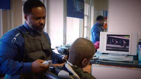 Wilmington principal bonds with young students through haircuts