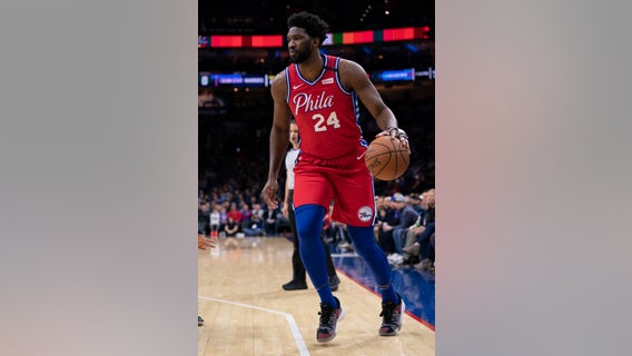 Embiid scores 24 in uniform No. 24 for Bryant in 76ers' win
