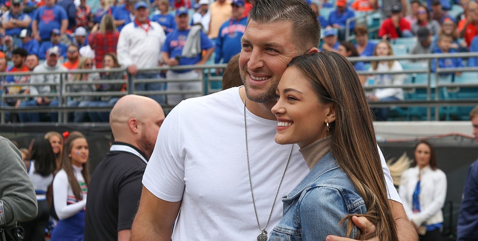 Demi-Leigh Nel-Peters Surprises Tim Tebow with High School Jersey