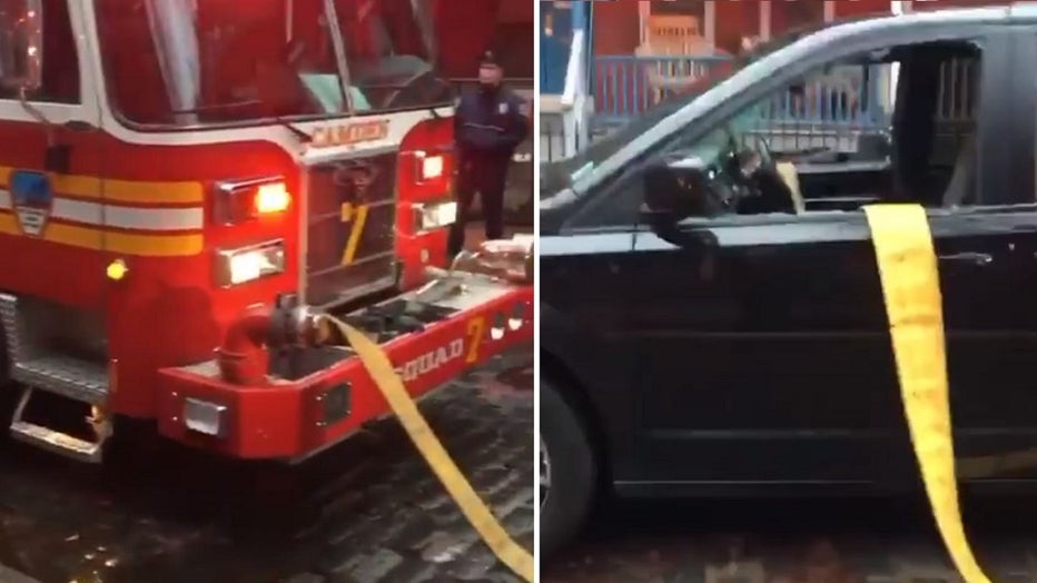 New Jersey fire fighters took no prisoners Saturday, smashing their way through the windows of an SUV parked in front of a hydrant in order to tackle a house fire.