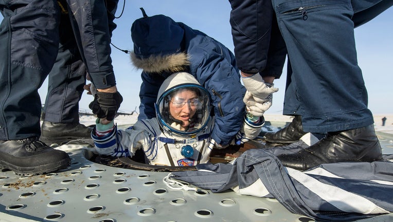 ZHEZKAZGAN, KAZAKHSTAN - FEBRUARY 6: In this handout image supplied by NASA, NASA astronaut Christina Koch is helped out of the Soyuz MS-13 spacecraft just minutes after she and her crewmates landed in a remote area near the town of Zhezkazgan, on February 6, 2020 in Kazakhstan.
