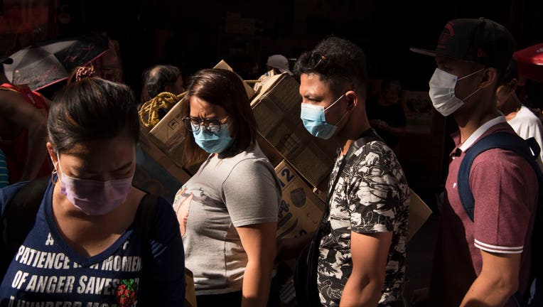 MANILA, LUZON, PHILIPPINES - 2020/02/02: Filipinos wearing face-masks following the virus outbreak.
Fear continues to mount in the Philippines over a new corona virus known as 2019-nCoV which originated in Wuhan, China in December 2019. The Philippines Department of Health announced the countrys first case of the virus on 30th January. The number of 2019-nCoV cases worldwide has already surpassed that of the 2003 Sars epidemic. (Photo by Oliver Haynes/SOPA Images/LightRocket via Getty Images)