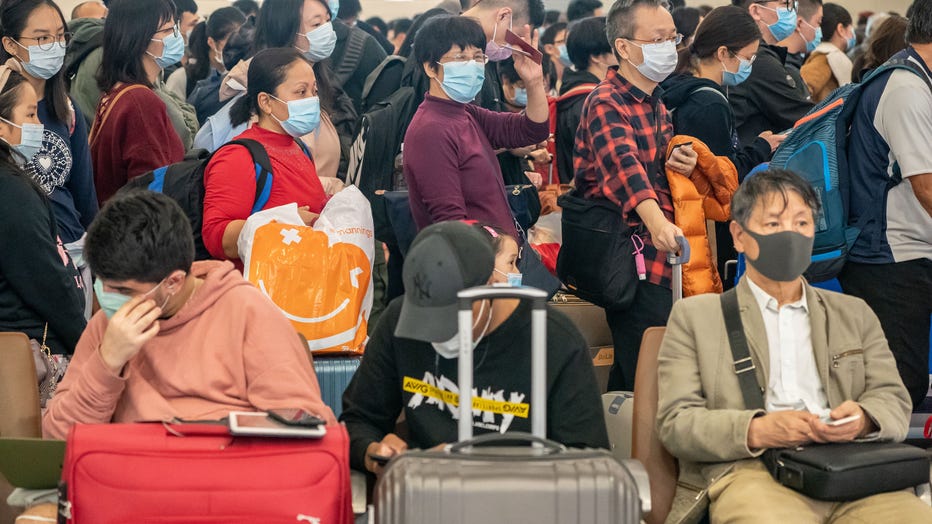 4a7a8c7b-Deadly Wuhan Coronavirus Spreads To Hong Kong