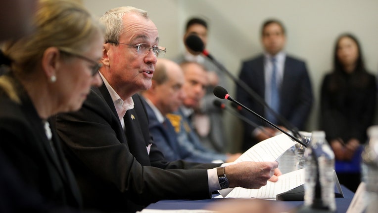 New Jersey Gov. Phil Murphy and Health Commissioner Judy Persichilli