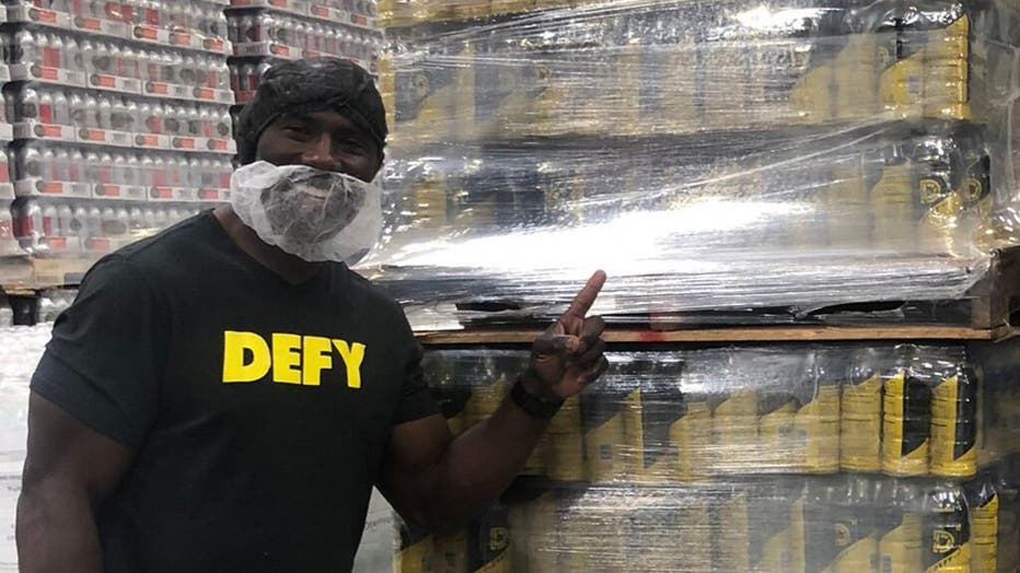 Terrell Davis and DEFY donated $400,000 worth of goods to Feeding America.