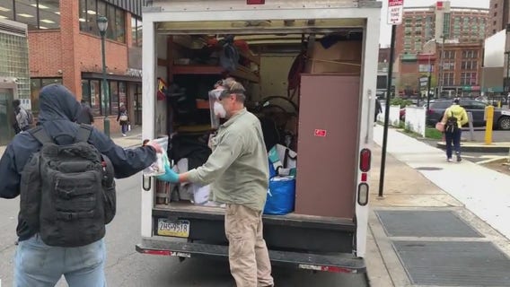 Volunteers hand out 'blessing bags' to help homeless